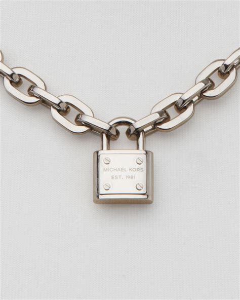 michael kors silver tone chain link padlock toggle necklace|Michael Kors Chain and Padlock Pendant Necklace .